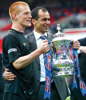 Ben Watson and manager Roberto Martinez.