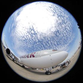 A Qatar Airways Boeing 787 Dreamliner is rolled to the static display area at Le Bourget airport near Paris. The air show runs until June 23. (Picture taken with a fisheye lens)