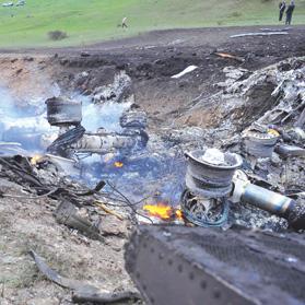 The wreckage of the Boeing KC-135 Stratotanker plane is seen at the site of the crash near the Kyrgyz village of Chaldovar, in Kyrgyzstan, yesterday. Photo: Reuters