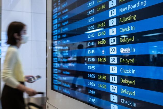 Four injured, flights cancelled in Japan as twin storms approach