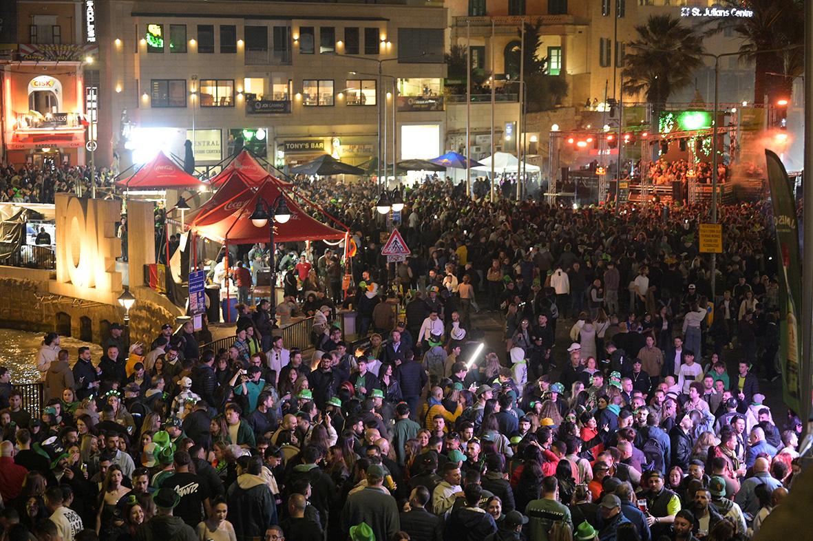 Hundreds of revellers celebrating St Patrick&rsquo;s Day in St Julian&rsquo;s. Photo: Matthew Mirabelli