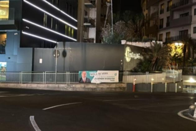 Momentum says more of its banners have been removed