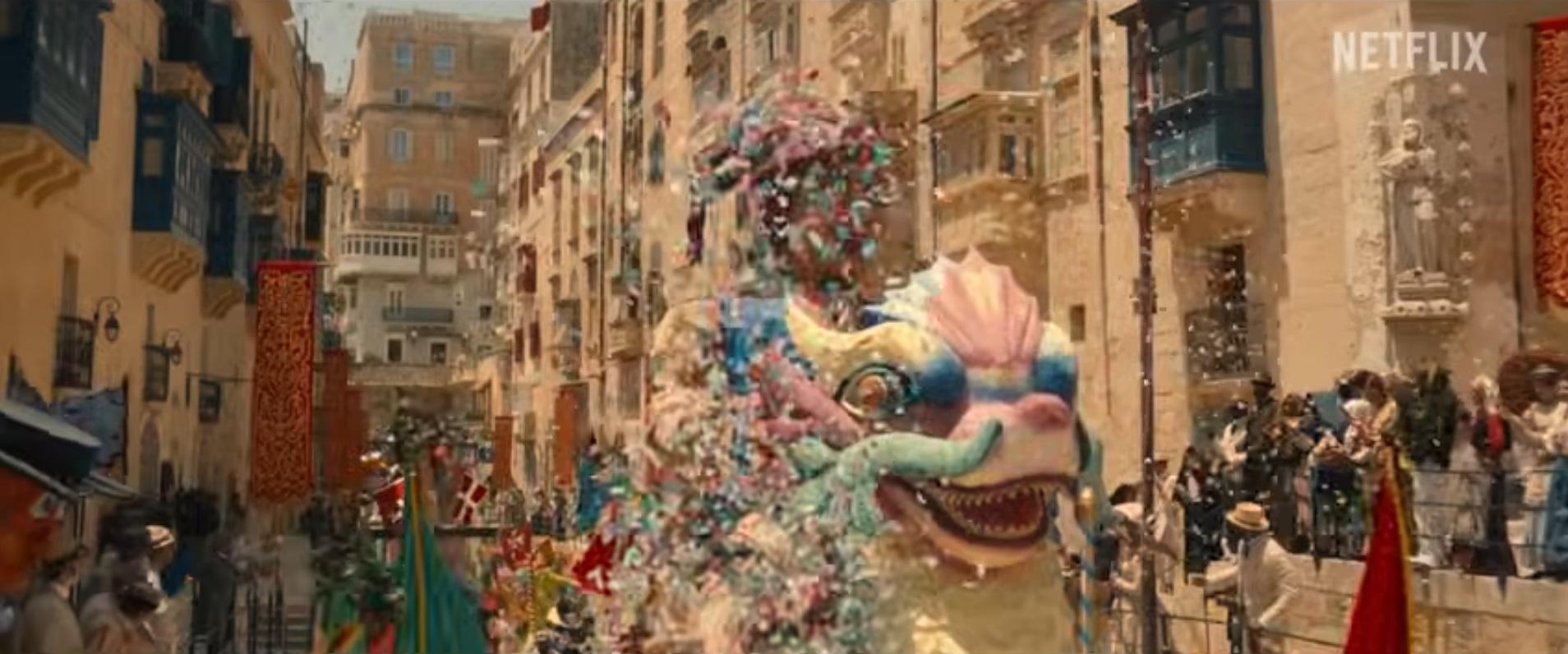An unusual site: a carnival float makes it to Triq il-Lvant in Valletta. Screenshot: Netflix/Enola Holmes 3