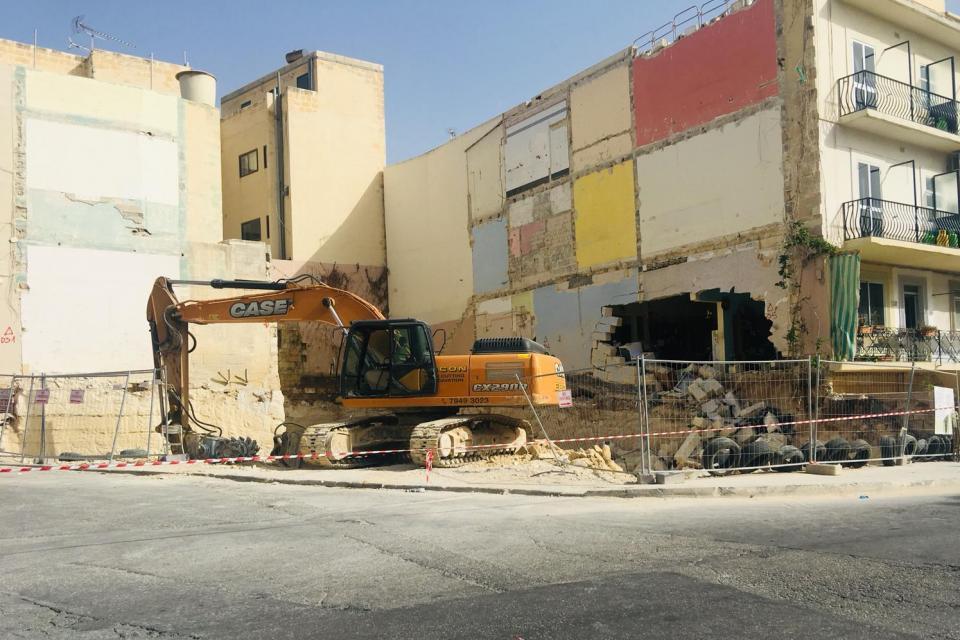The gaping hole in a Guardamangia block of apartments after a wall collapsed.