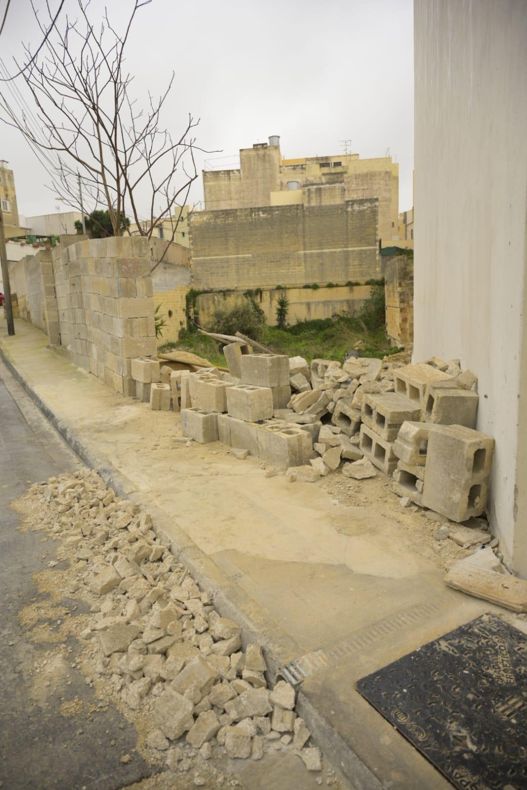 A wall next to Carters Supermarket in Tarxien collapsed from the strong winds. Photo: Matthew Mirabelli.