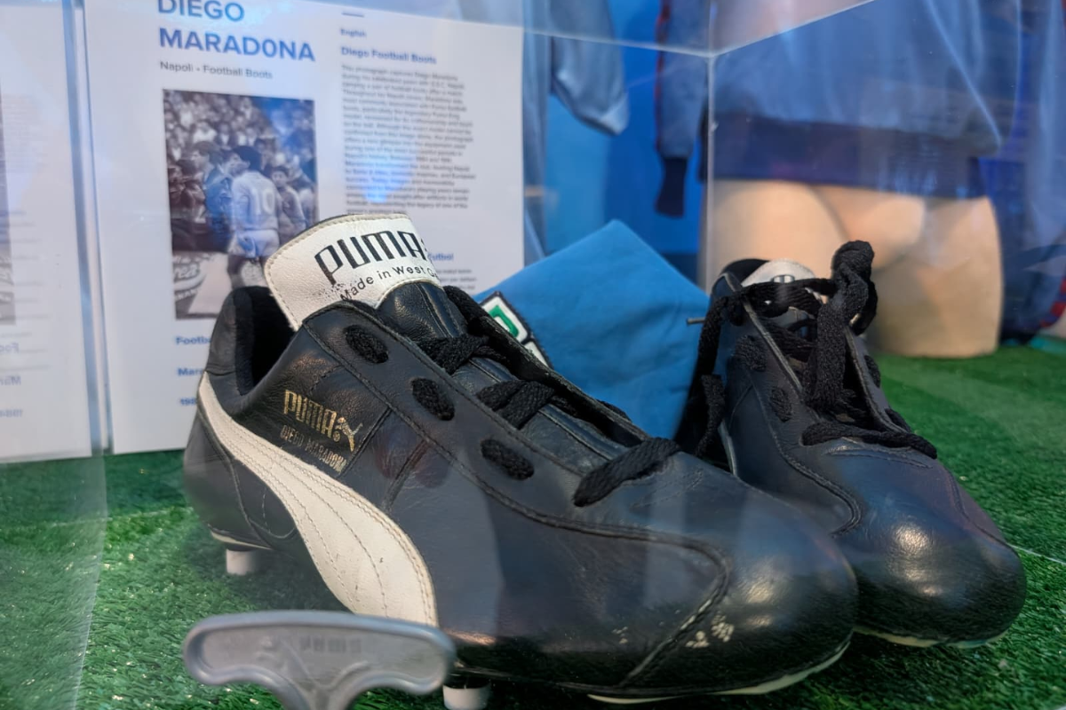 The football boots worn by the Argentine football player are on display in the exhibition. Photo: Chris Sant Fournier