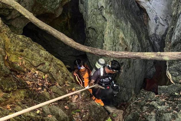 Rescue divers find five men trapped in flooded Laos cave for a week