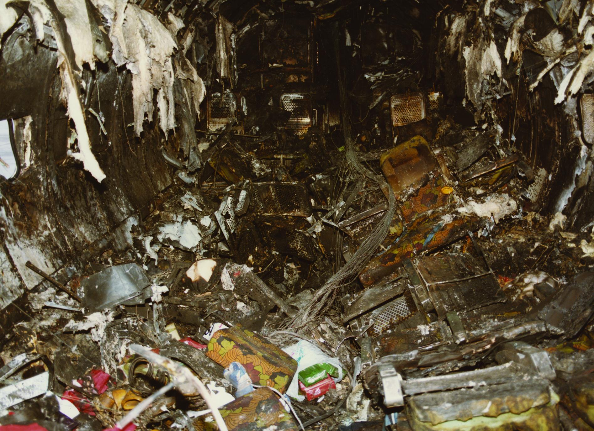 Inside the body of the plane.
