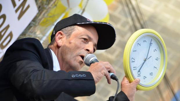 Zaren Bonnici waves a clock he said was given to him. Picture - Christian Farrugia