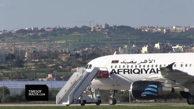 The hijacked plane in a video grab from <em>Times of Malta</em> footage.