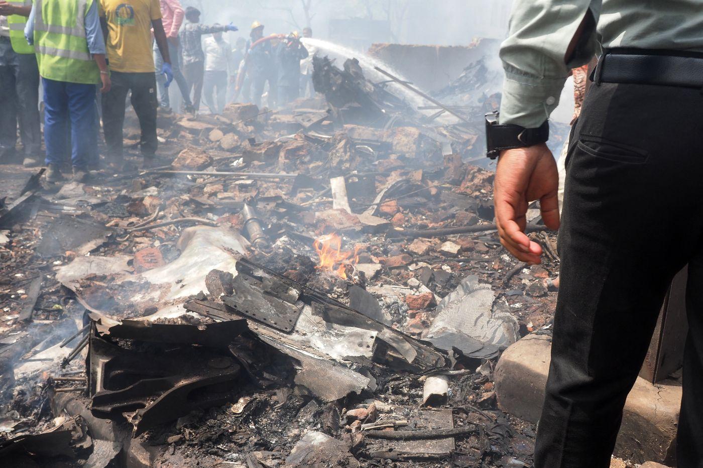 Debris is seen at the site where Air India flight 171 crashed in a residential area near the airport in Ahmedabad. Photo: AFP