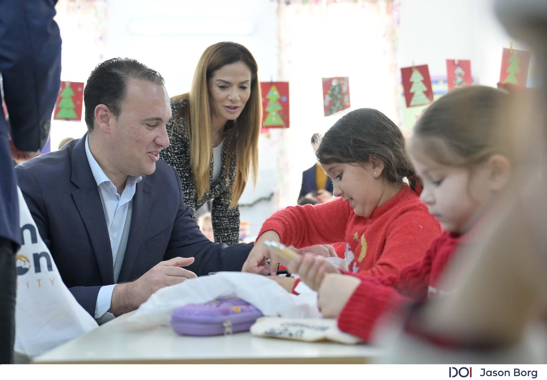 Education Minister Clifton Grima and Environment Minister Miriam Dalli with students at Sacred Heart School. Photo: DOI