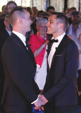 Vincent Autin (left) and Bruno Boileau holding hands after getting married at the town hall in Montpellier, yesterday. Photo: Reuters