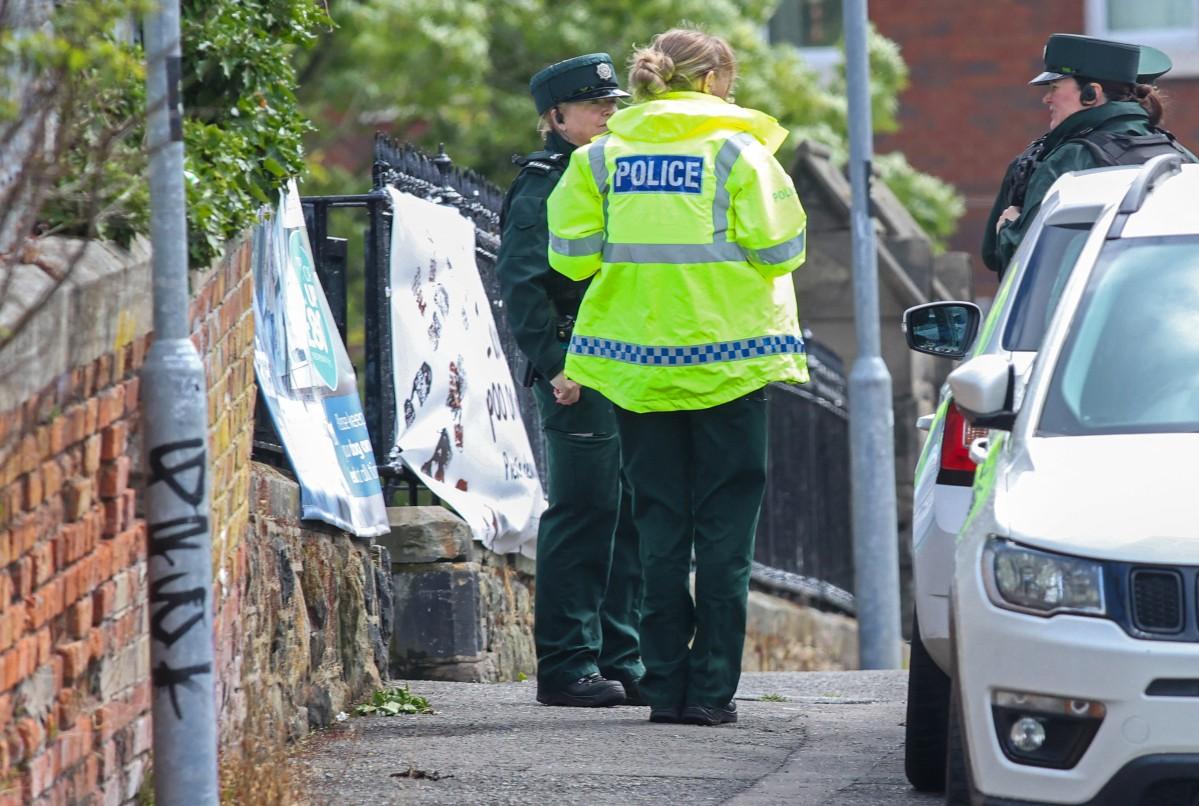 Police work at the scene of the stabbing on Kinnaird Avenue in north Belfast. Photo: AFP