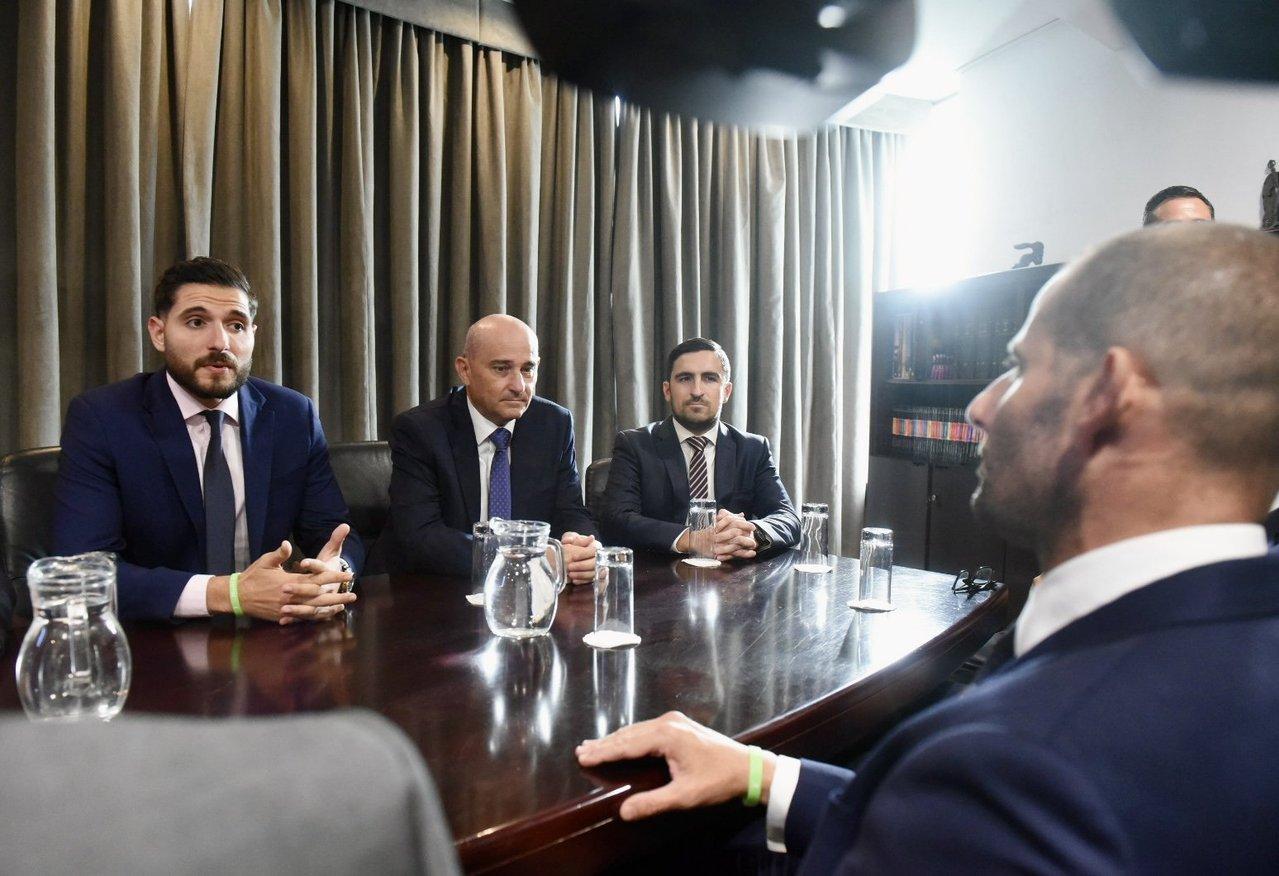 Opposition Leader Alex Borg discussing with PM Robert Abela during the latter's visit to the PN headquarters earlier this year. Photo: Charles Bonello