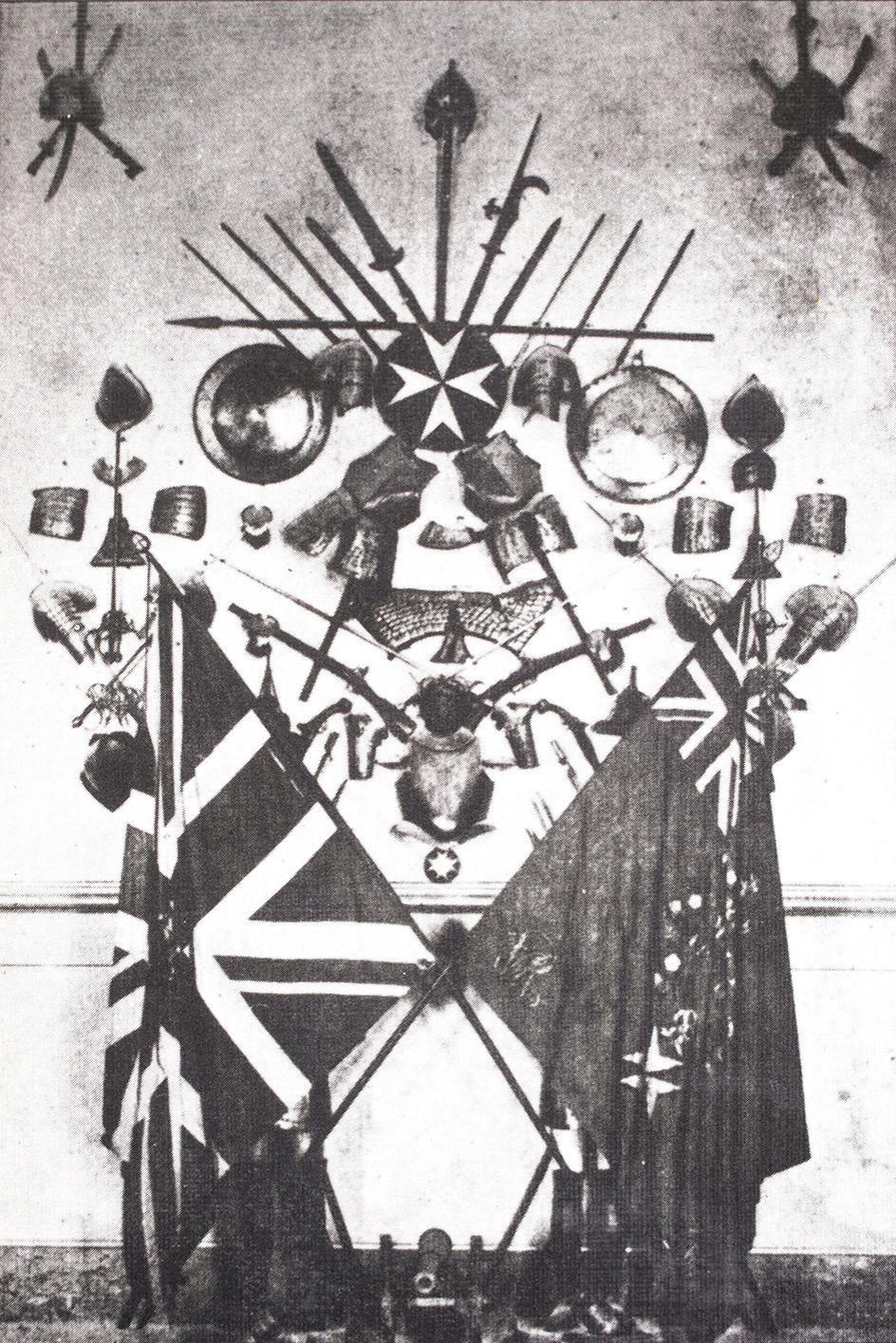 Postcard of the Palace Armoury showing Maltese regimental trophies, c 1920