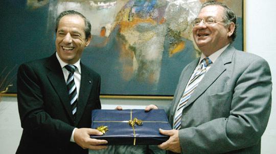 Former prime minister Lawrence Gonzi (left) presenting a gift to Laurence Grech on his retirement in 2007. Photo: Chris Sant Fournier.
