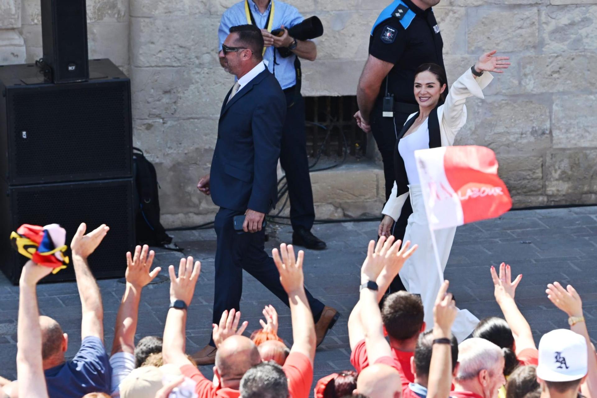 Miriam Dalli, right, who was elected on two districts, waves to the crowds. Photo: Matthew Mirabelli