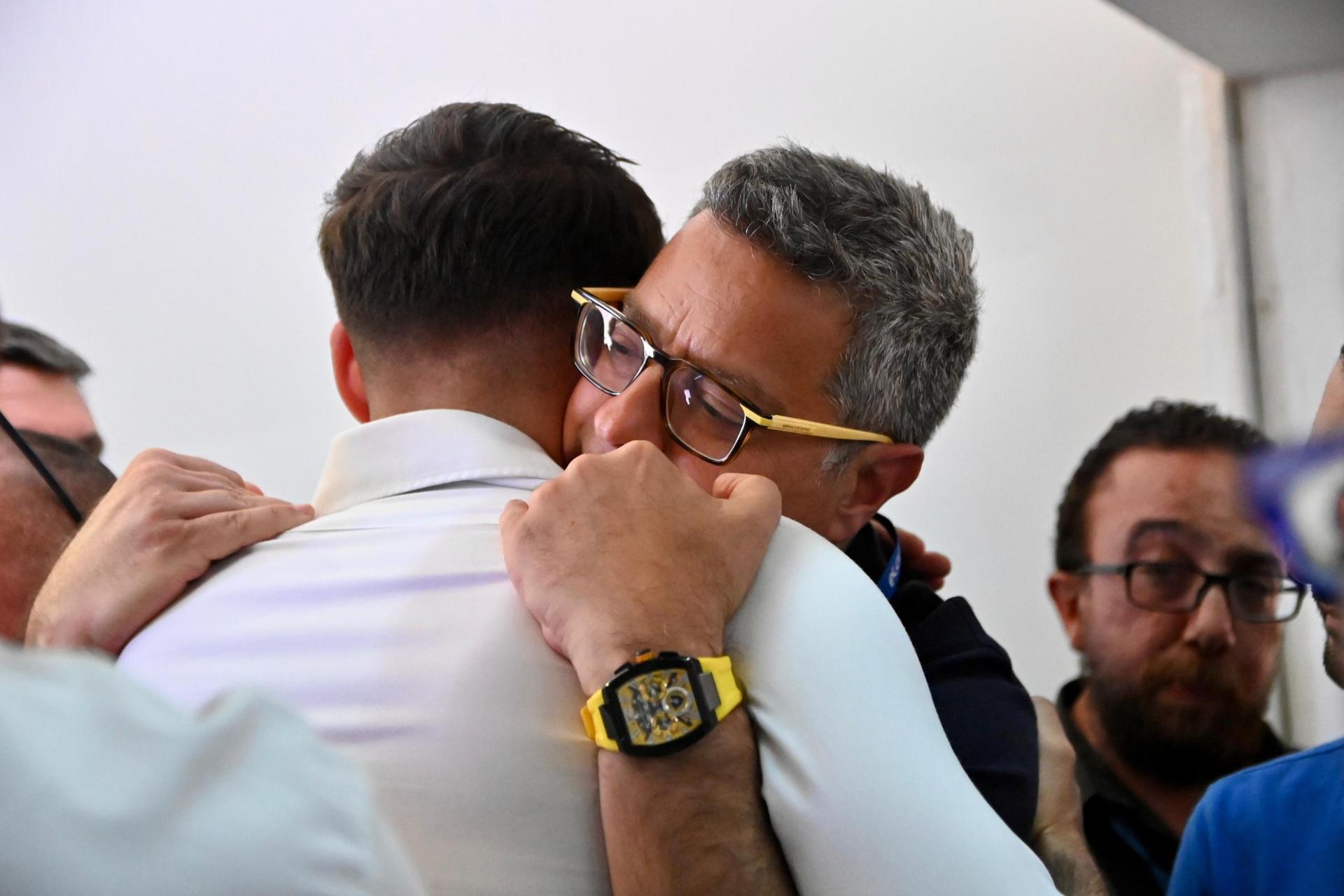 Alex Borg and Adrian Delia embrace on Sunday afternoon. Photo: Chris Sant Fournier