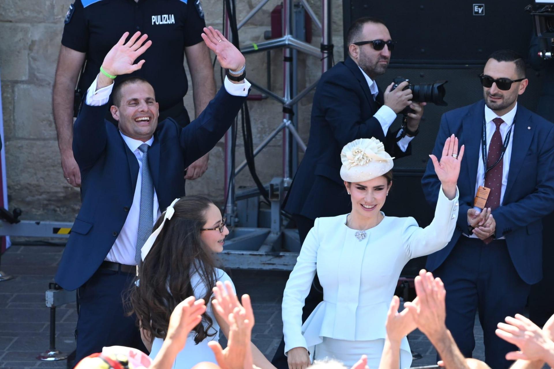 Robert Abela, his wife, Lydia, and their daughter Giorgia Mae wave to well-wishers in Valletta. Photo: Matthew Mirabelli