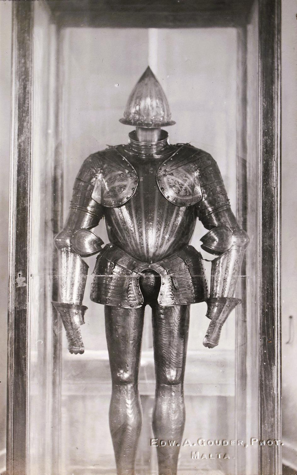 A half-armour from the Palace armoury. A postcard by Edward A. Gouder