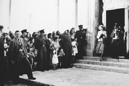 Princess Elizabeth leaving the Mdina Cathedral after a visit in 1949, accompanied by Archbishop Michael Gonzi. Photo: British High Commission/DOI. Slide for more.