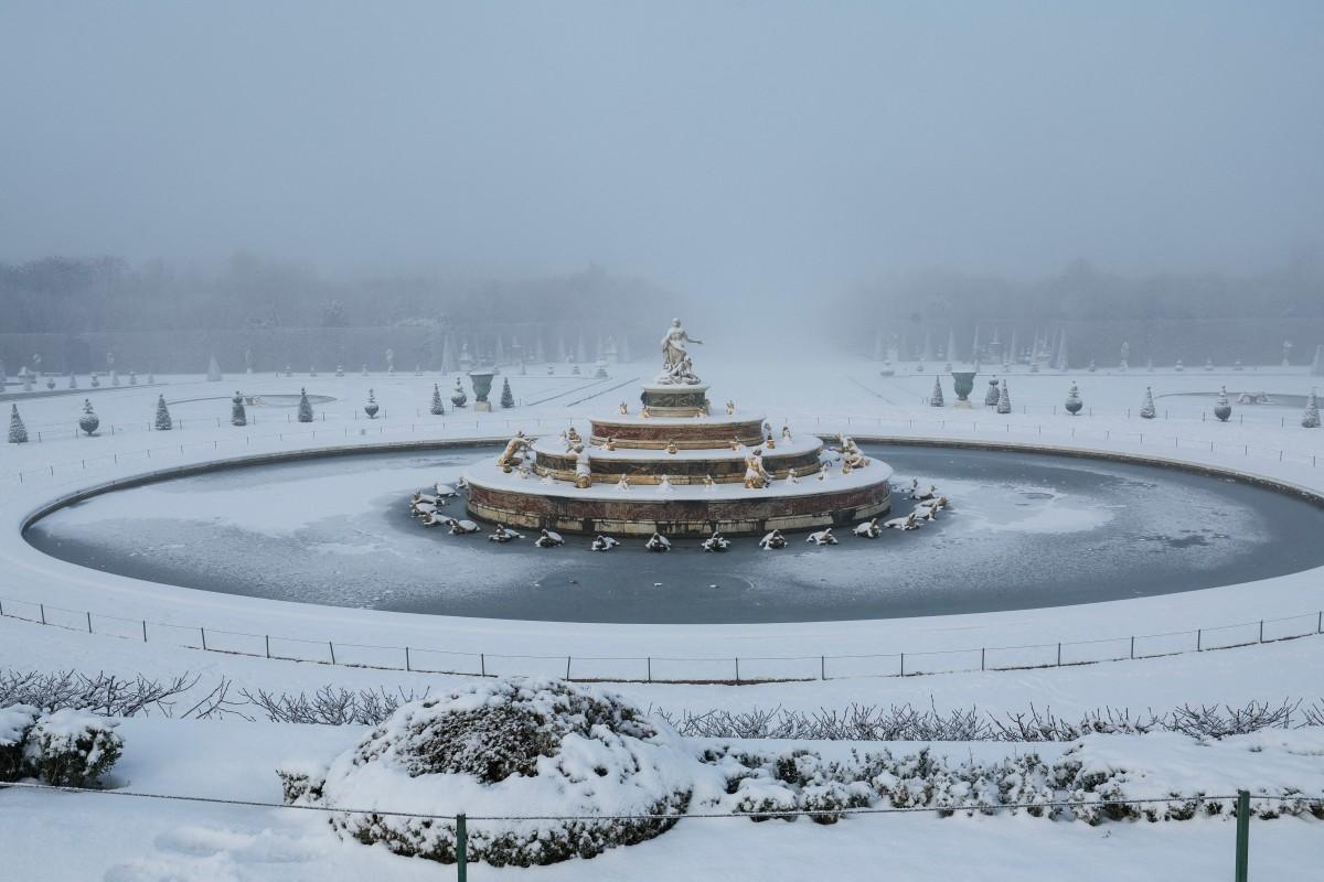 Snow blankets Latona's Pool and Parterre in the gardens of Versailles outside Paris.