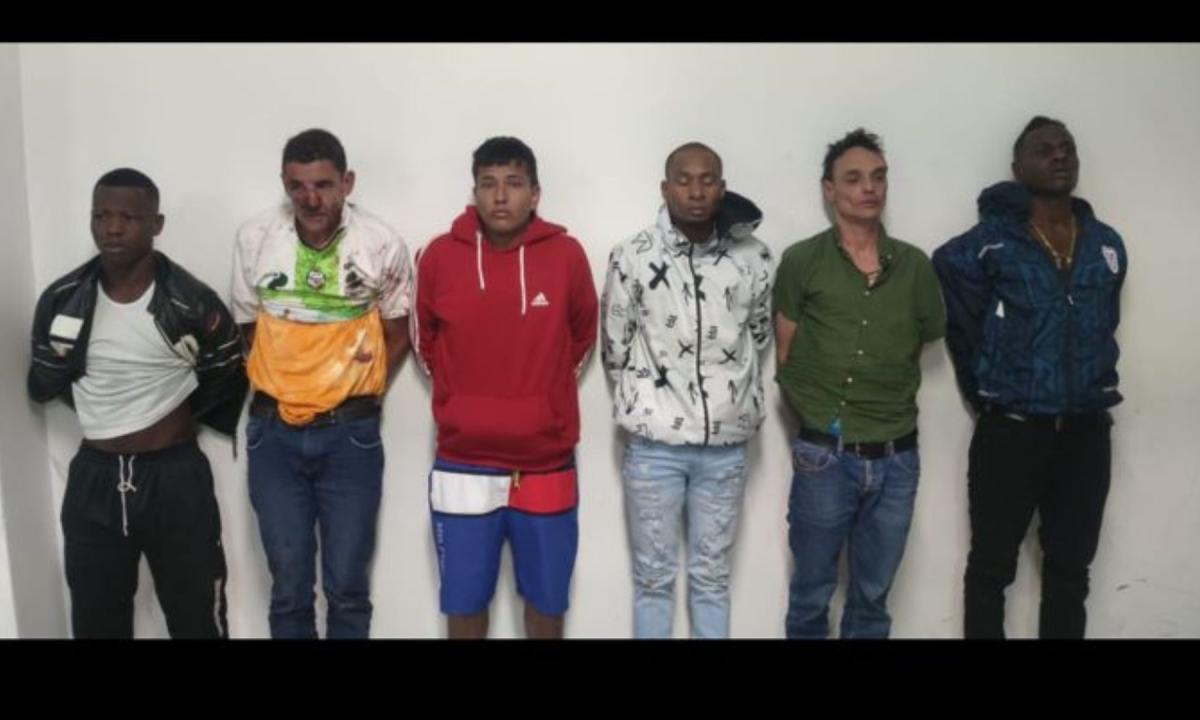 A handout of the six assassination suspects provided by Ecuadorian police at the time of their arrest.