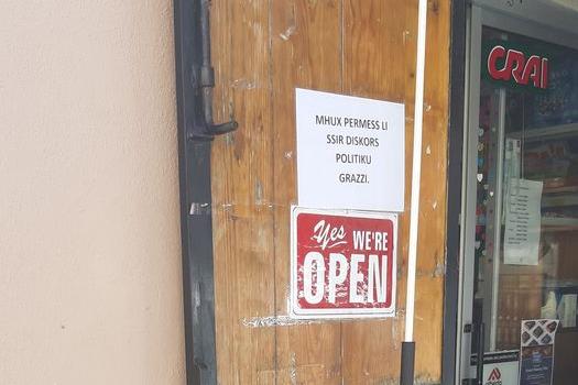 The sign on the door of the grocers in Siġġiewi. Photo: Facebook