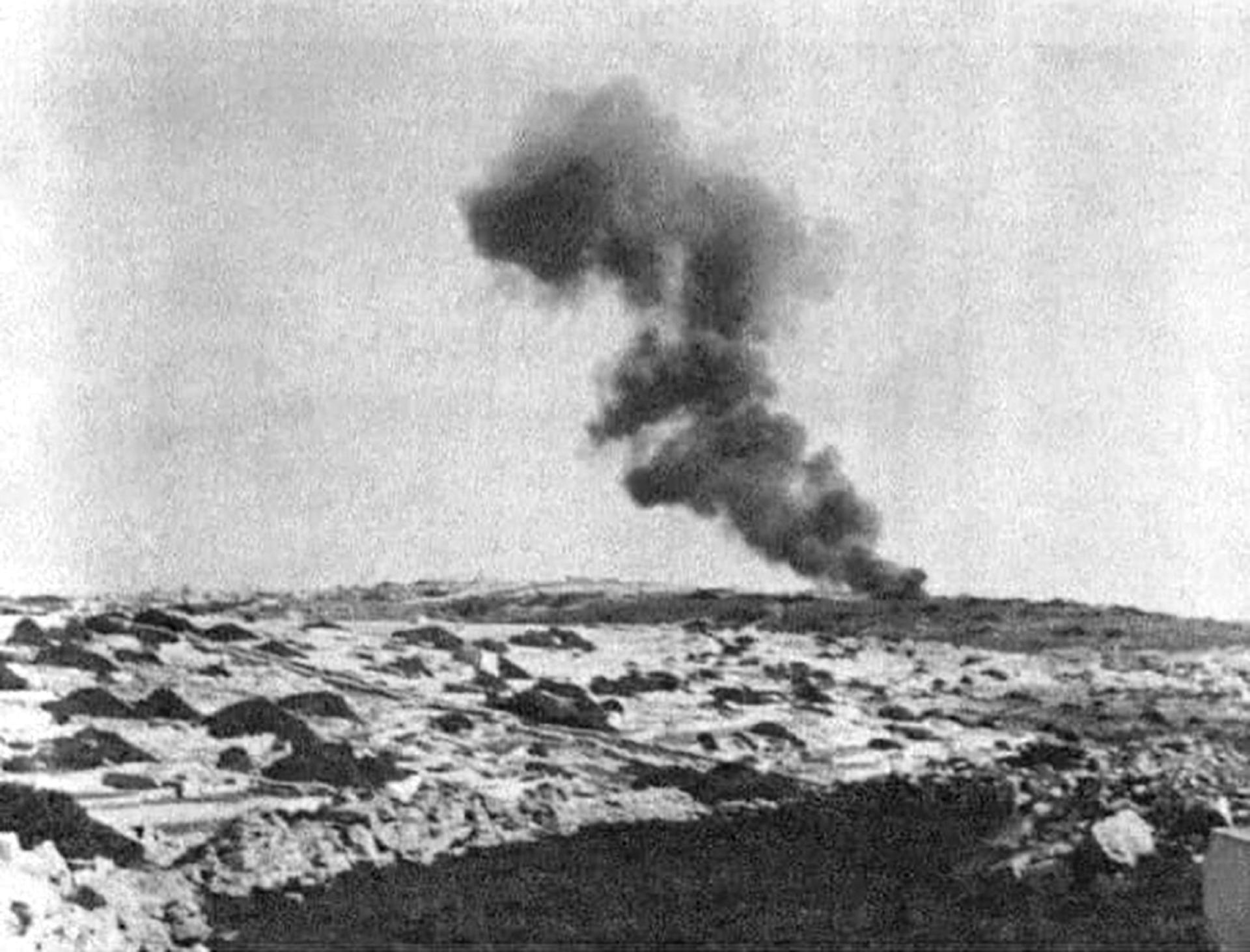 Smoke rising from the crash site shortly after impact. Photo: The Bureau of Aircraft Accidents Archive