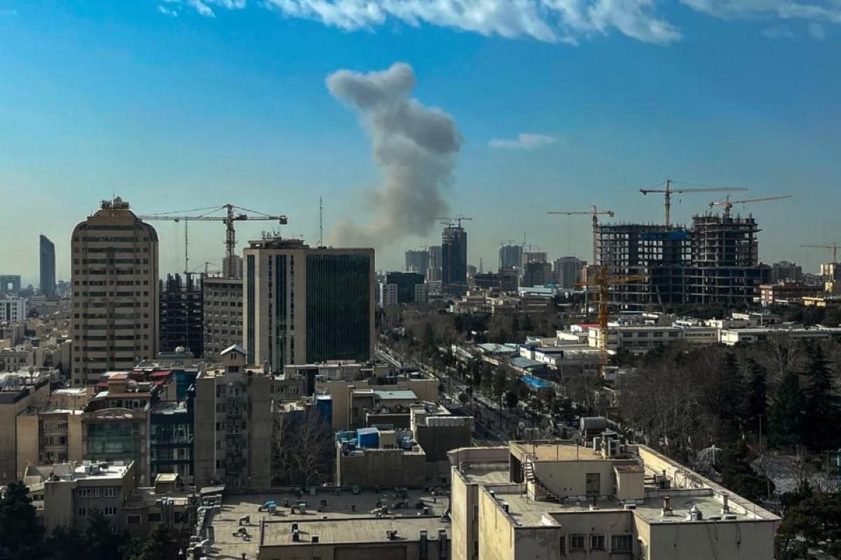 Smoke rises above Tehran following the onset of strikes two weeks ago. Photo: AFP