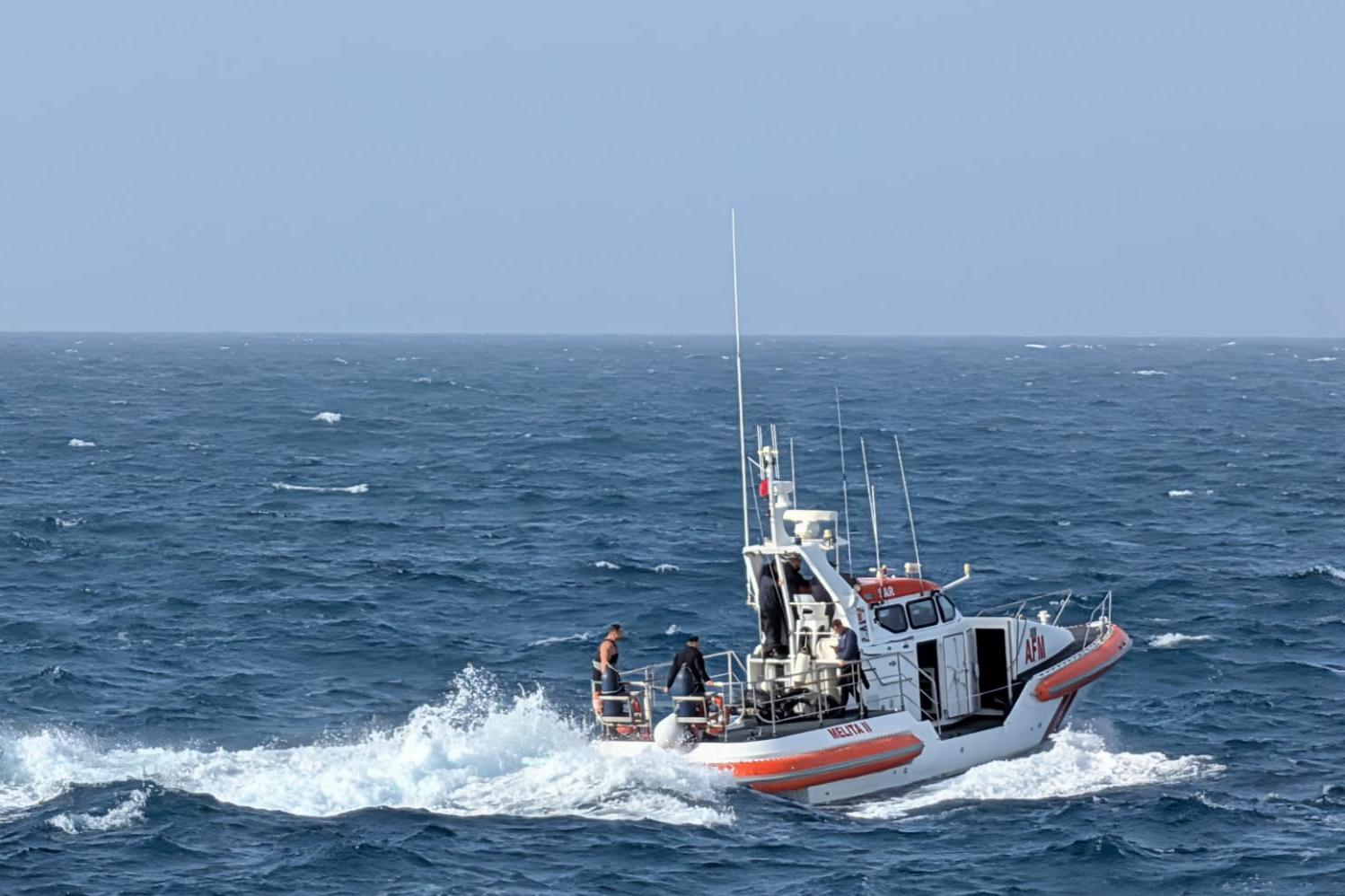 A rescue boat searches off Paradise Bay on Wednesday. Photo by Chris Sant Fournier.