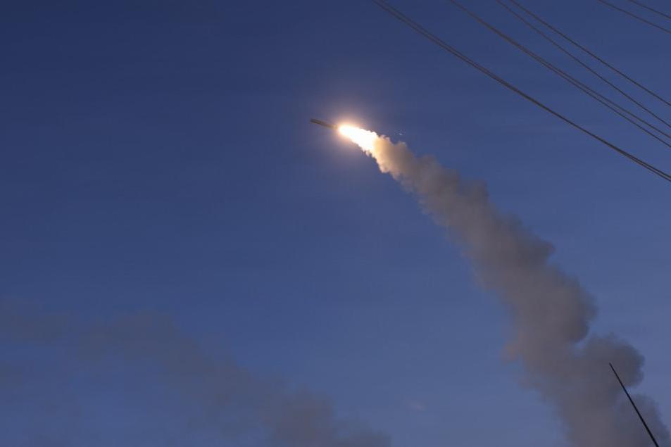 Arleigh Burke-class guided-missile destroyer USS Thomas Hudner (DDG 116) firing a Tomahawk land attack missile at Iran.
