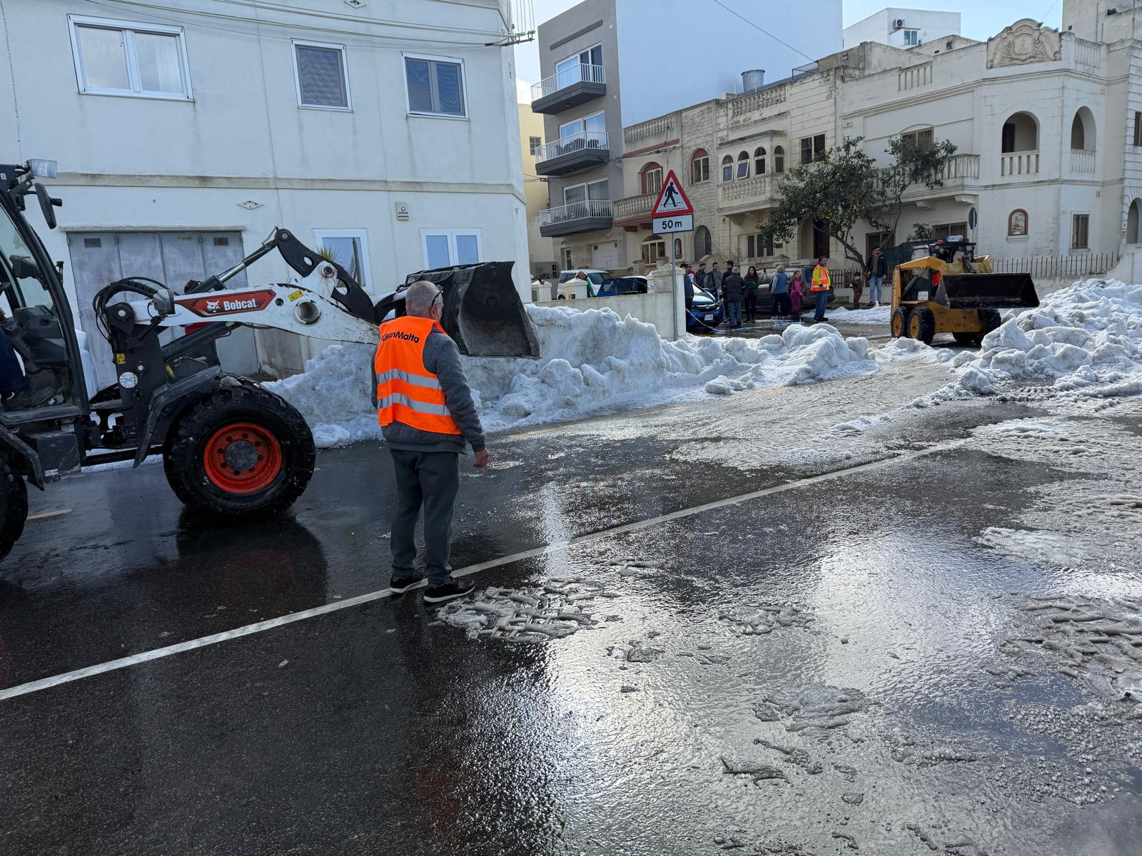 Cleansing Maintenance Division staff worked through the day to clear Rabat roads of the ice. Photo: CMD