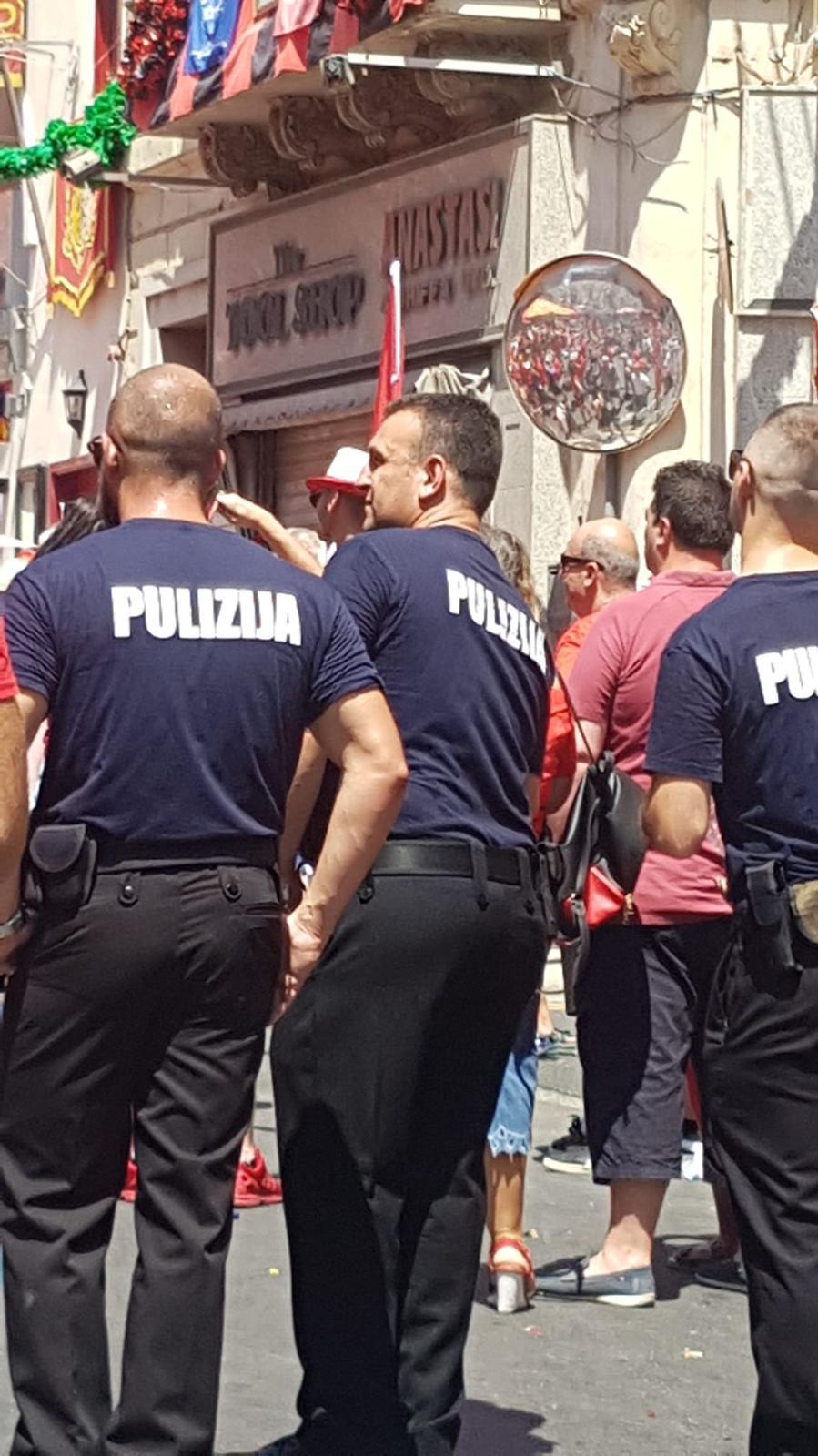 Grech (middle) a police officer on duty. Photo: Sandro Grech