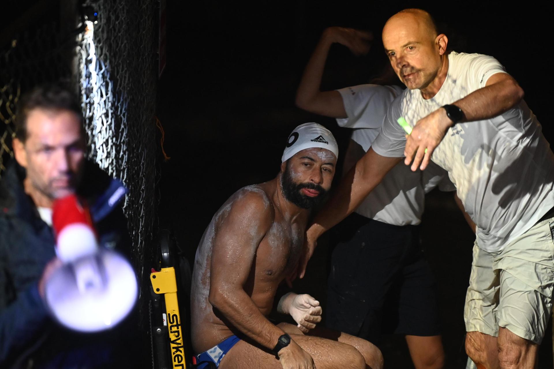An exhausted Neil Agius after his world record swim in 2024. Photo: Jonathan Borg