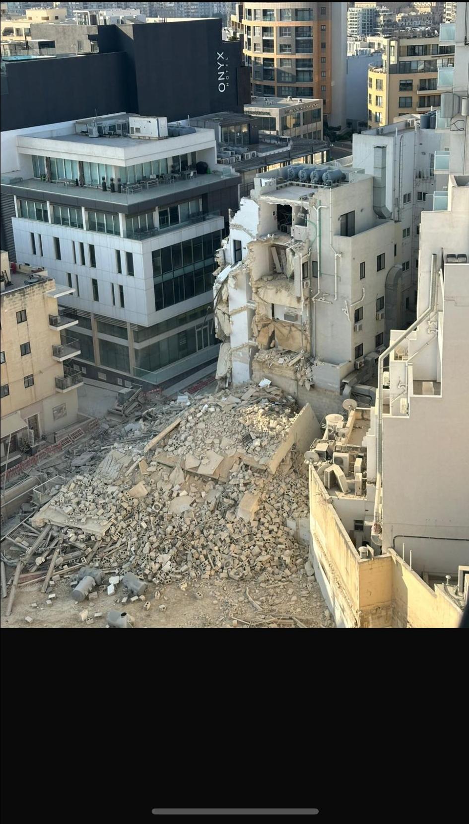 The collapsed Tania Flats in the heart of Paceville.
