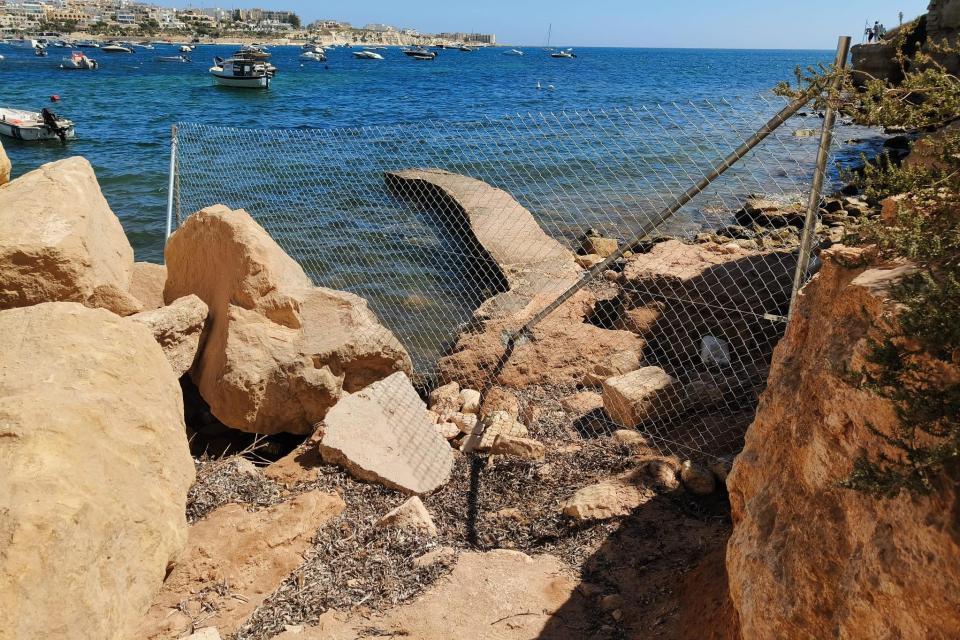 Recently installed fencing around the Marsascala area where Mirabelle Falzon was killed by falling rocks. Photo: Public Works Department