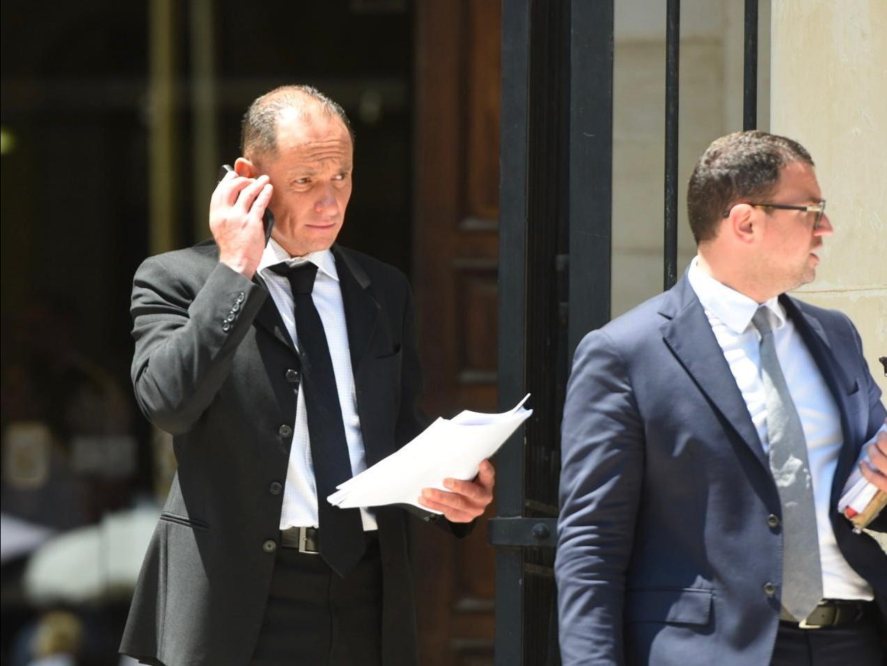 Mark Xuereb leaving court on Monday, accompanied by his lawyer Matthew Xuereb. Photo: Chris Sant Fournier