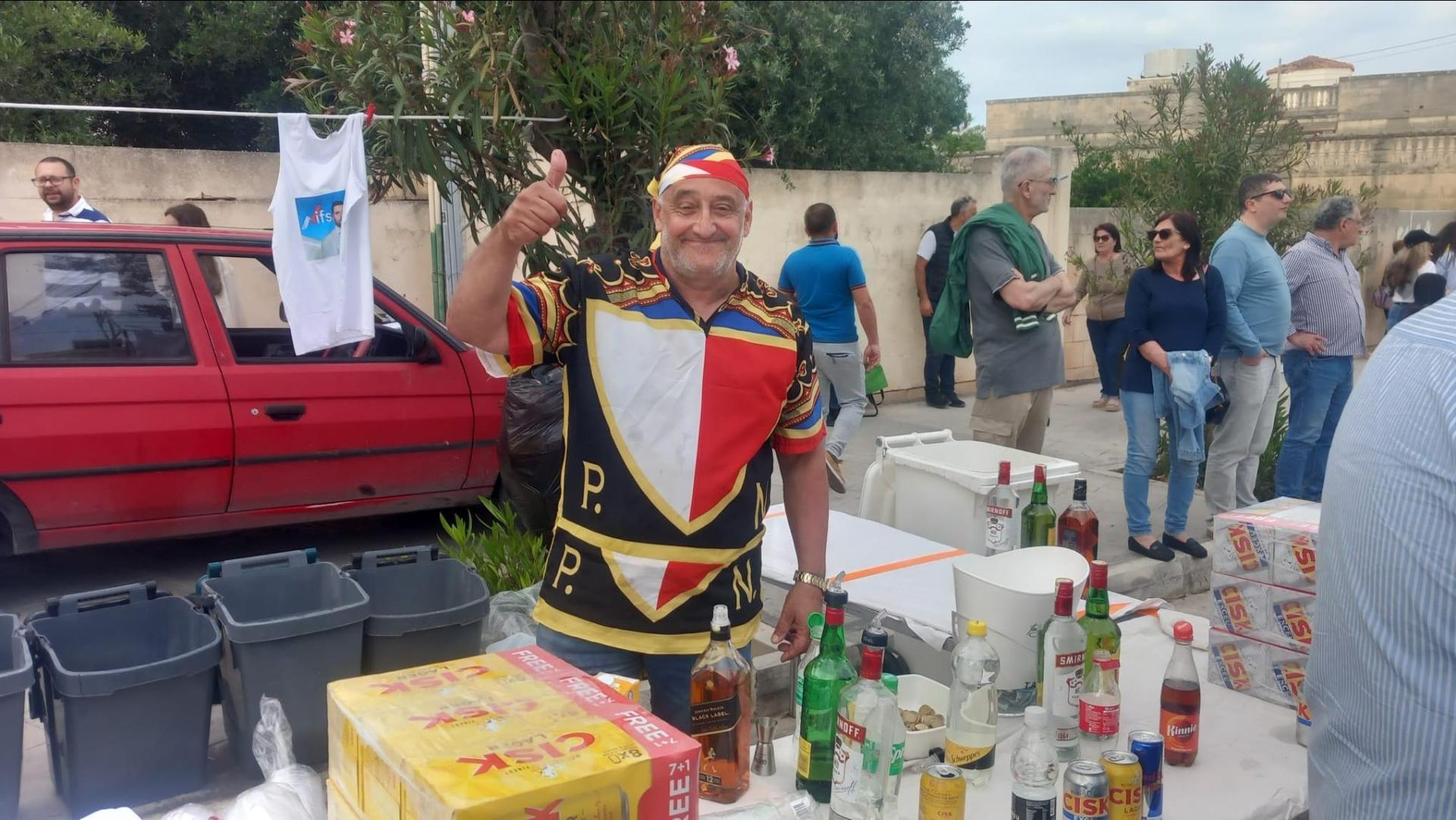 This PN supporter and helper is getting into the spirit of the event as he mans one of the bars at the rally. Photo: Daniel Ellul