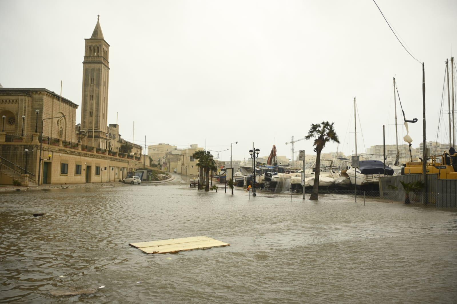 A door floats down the road in Marsascala, which saw flooding. Photo: Matthew Mirabelli.
