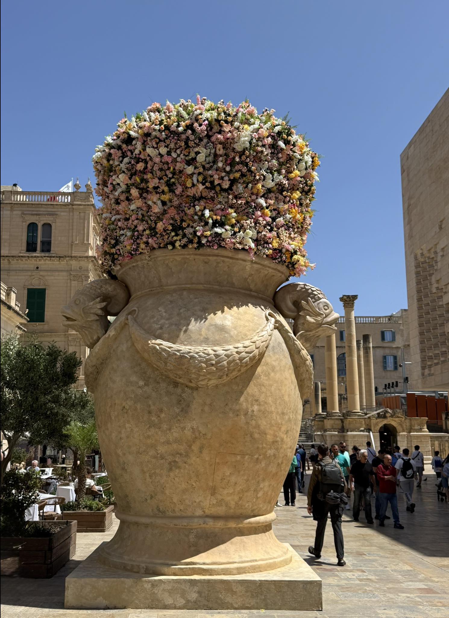 Thousands of flowers decorate the entrance to the capital city.