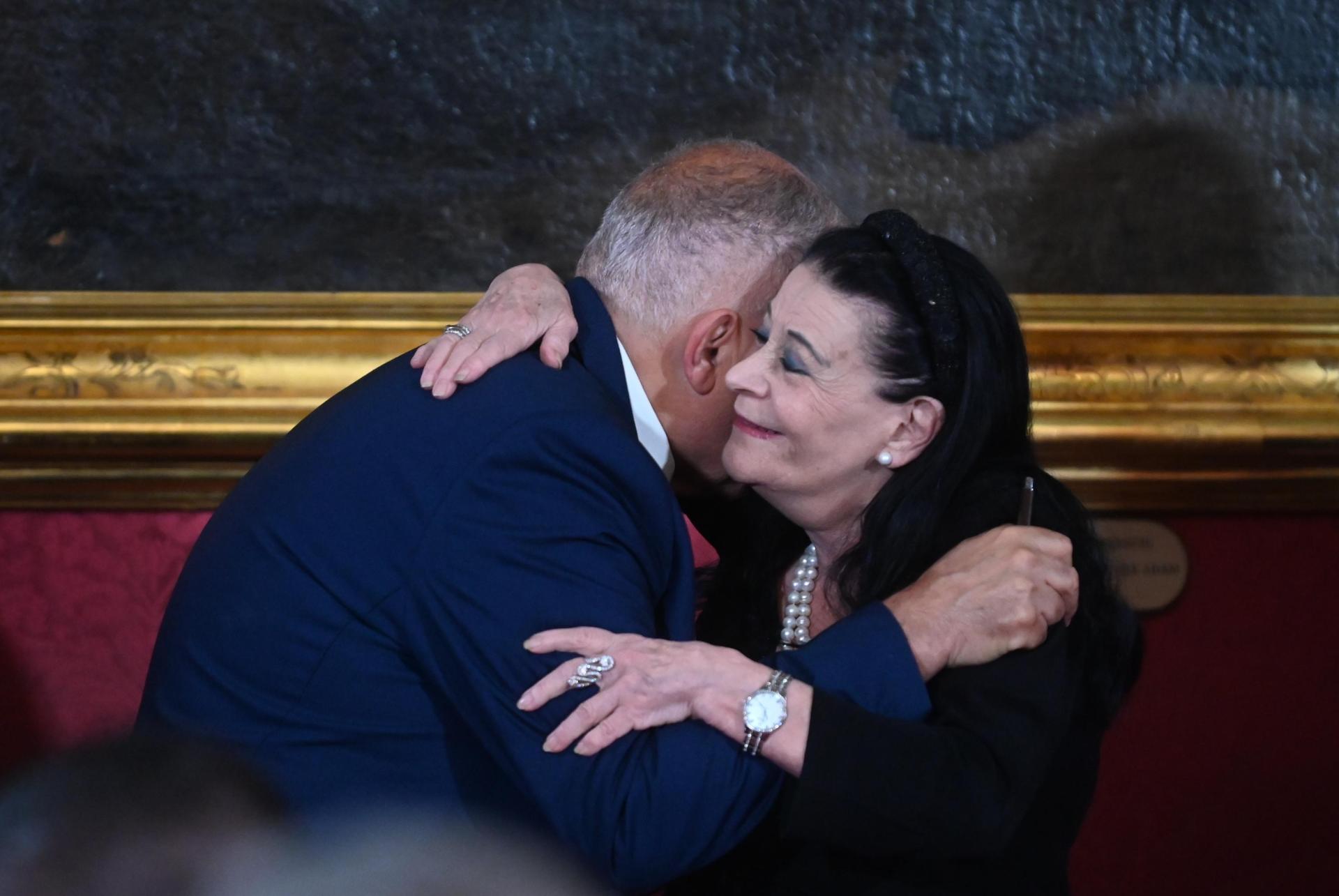President Myriam Spiteri Debono greets Agriculture Minister Anton Refalo with a hug. Photo: Jonathan Borg