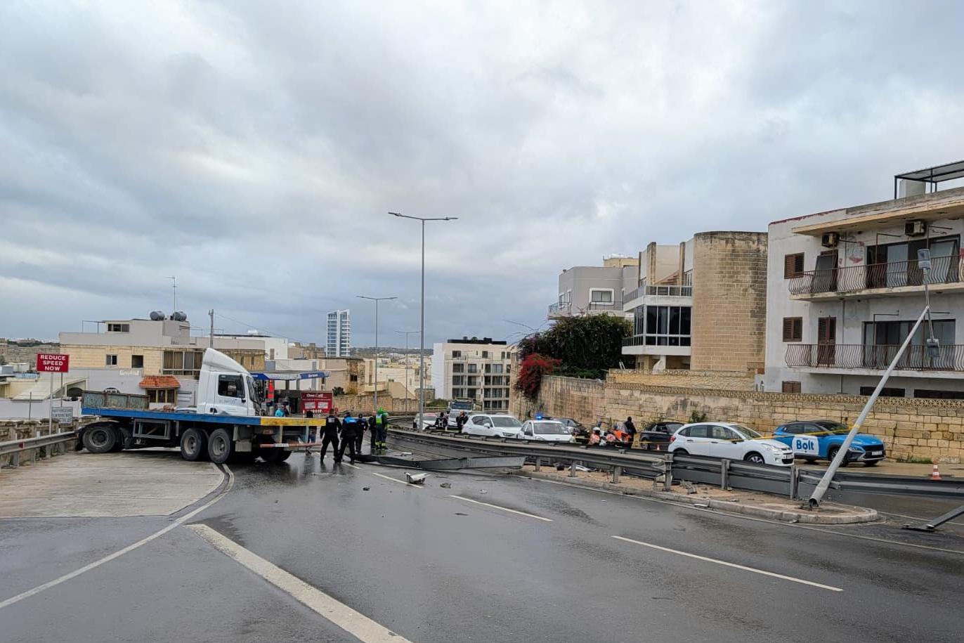 The trailer pulled out a crash barrier and dislodged an electricity pole. Photo Chris Sant Fournier.