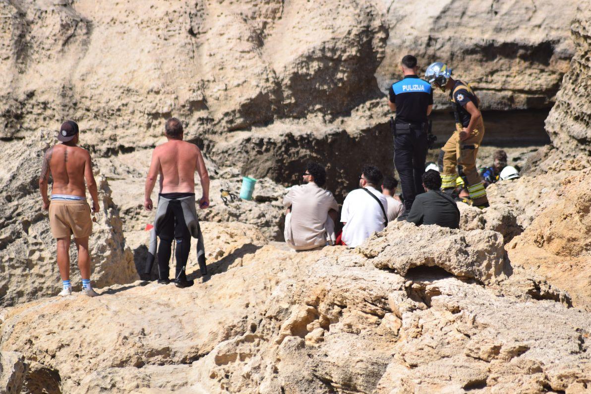 Divers and other onlookers at the scene of the incident in Dwejra. Photo Christo Scerri.