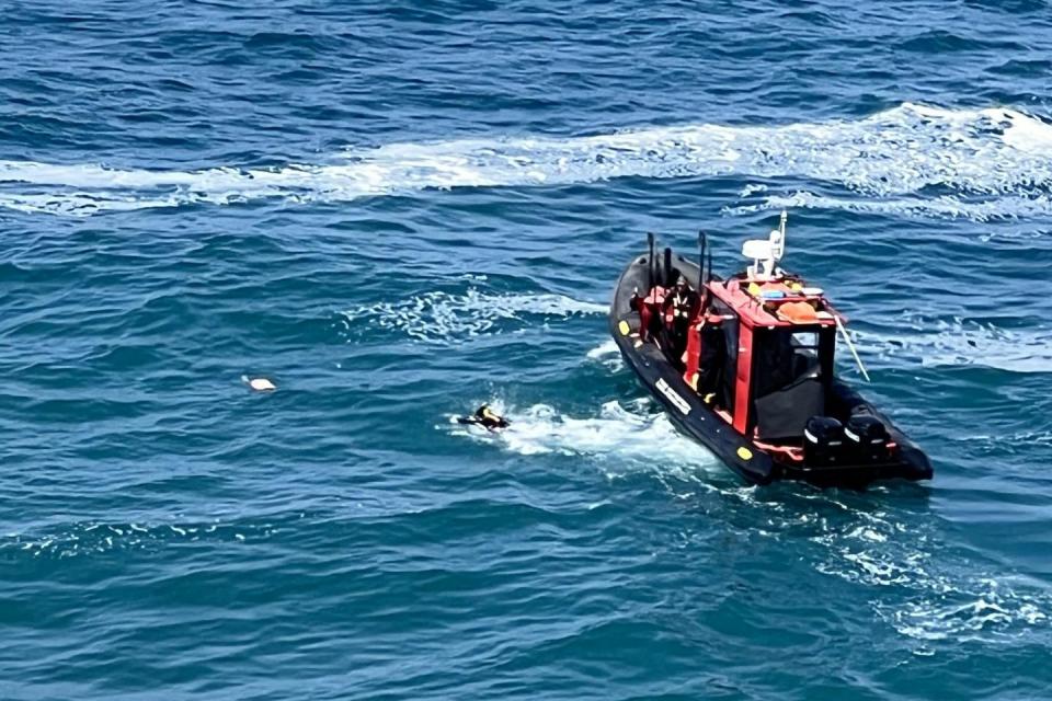 A photo of the rescue operation underway taken by an onlooker.