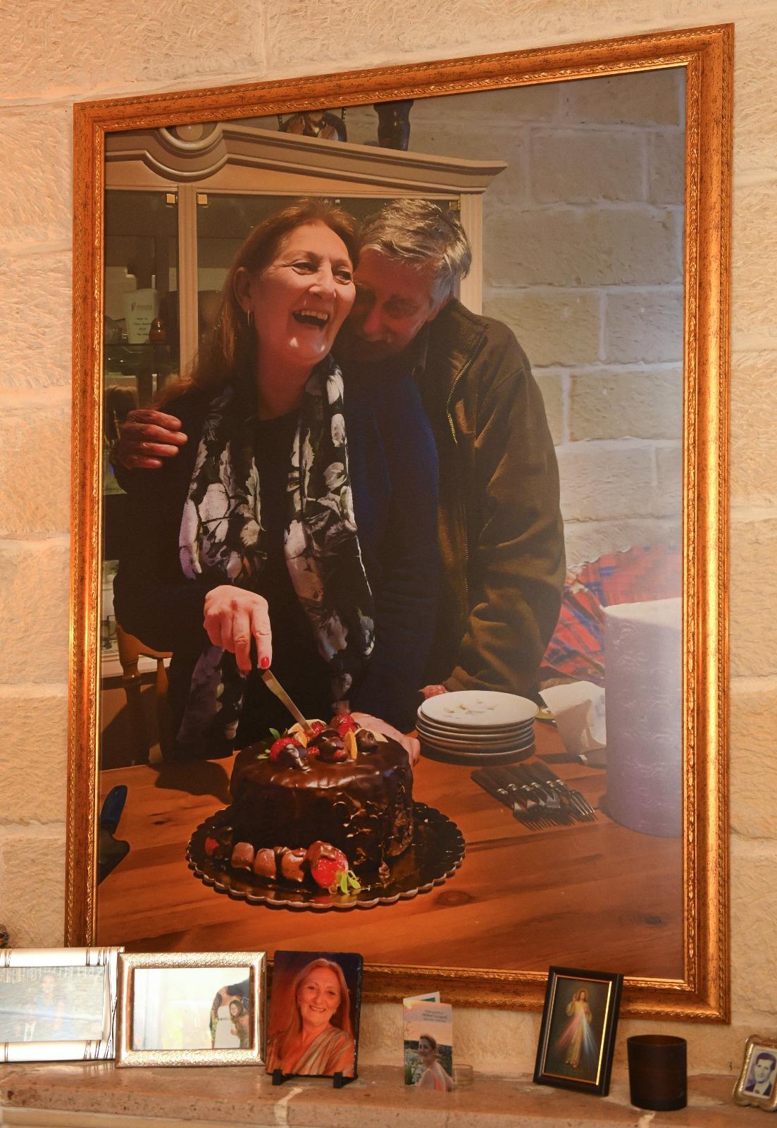 Happier times - A large framed photo of Mildred and Alfred Azzopardi hanging in their living room..