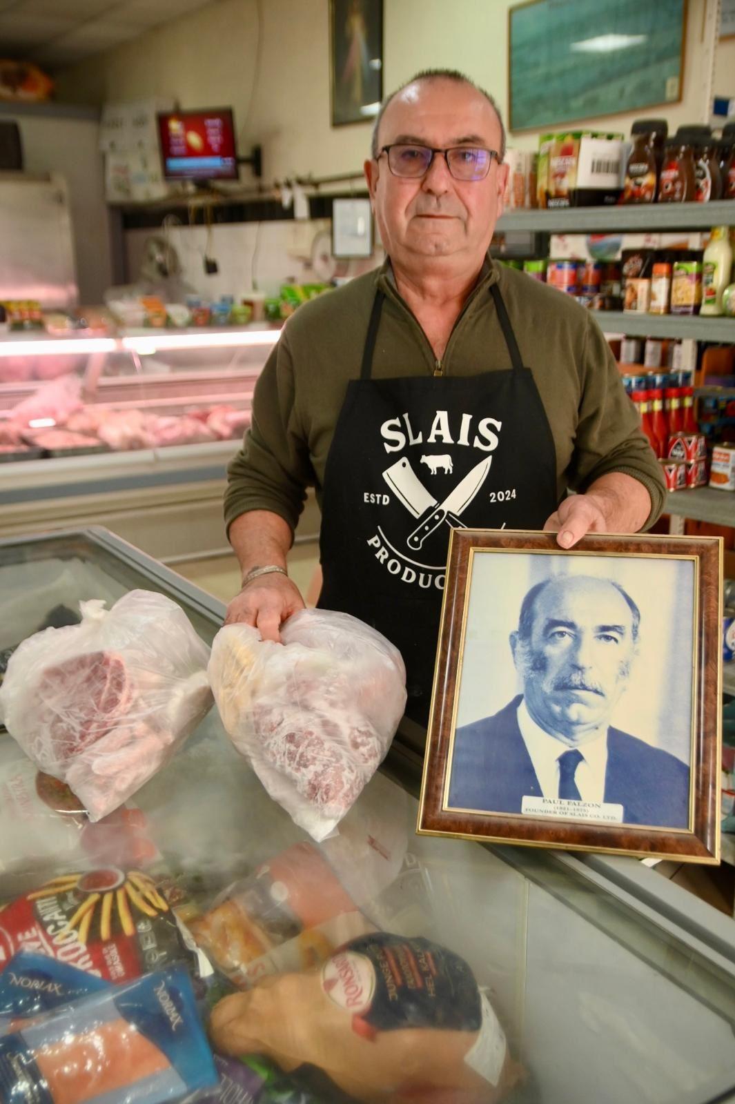 Alex Falzon, with a portrait of his father, Pawlu, from whom he inherited this initiative from.