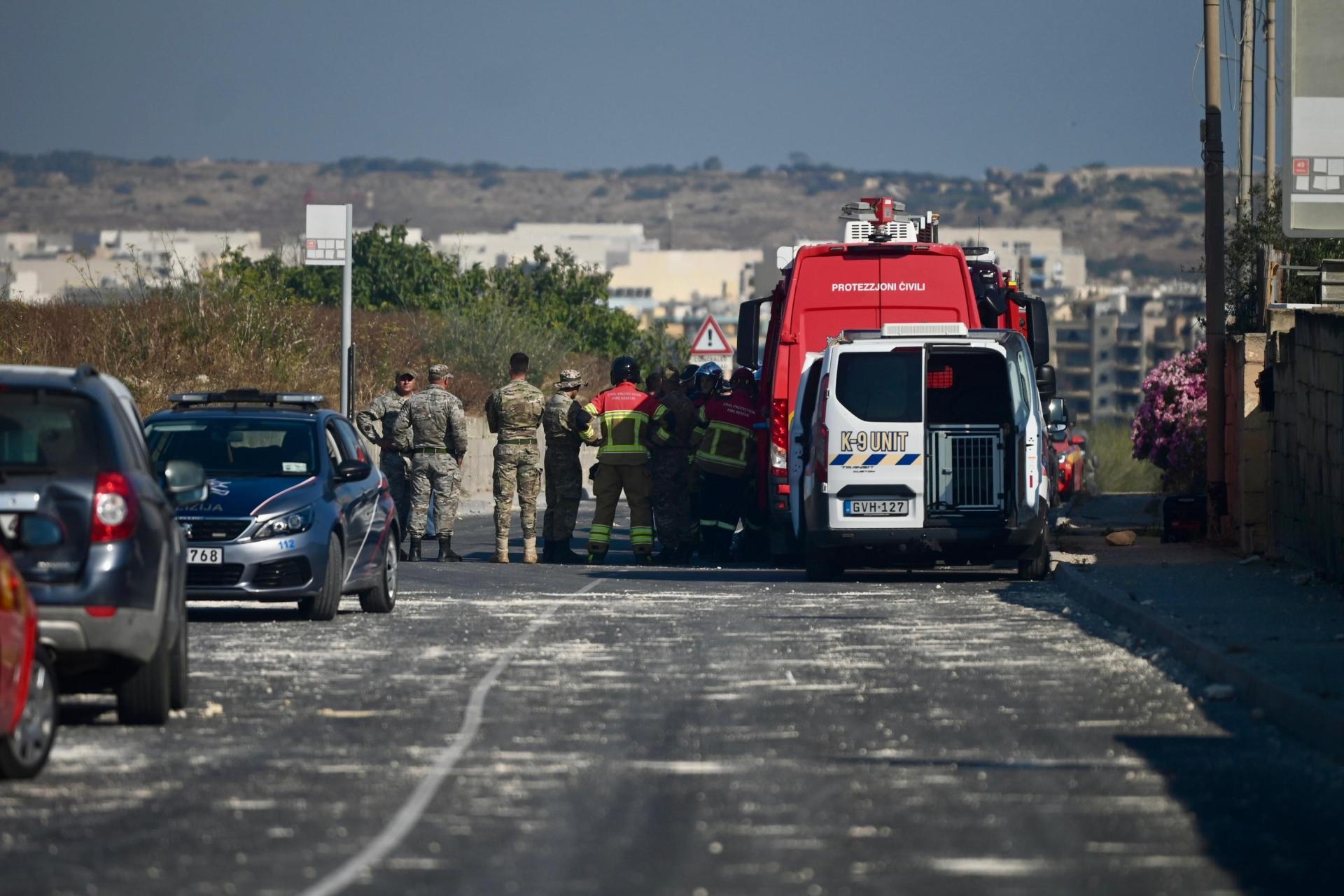Rescue teams near the site of the explosion.