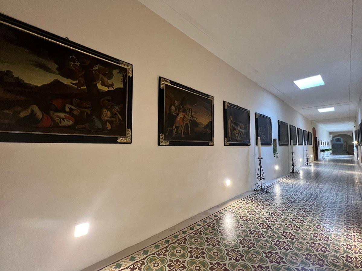 The set of 12 paintings narrating the Legend of Liesse displayed in a hallway at Ta&rsquo; Ġieżu convent, Valletta, photographed before the conservation project began. Photo: ASC Conservation Centre Ltd